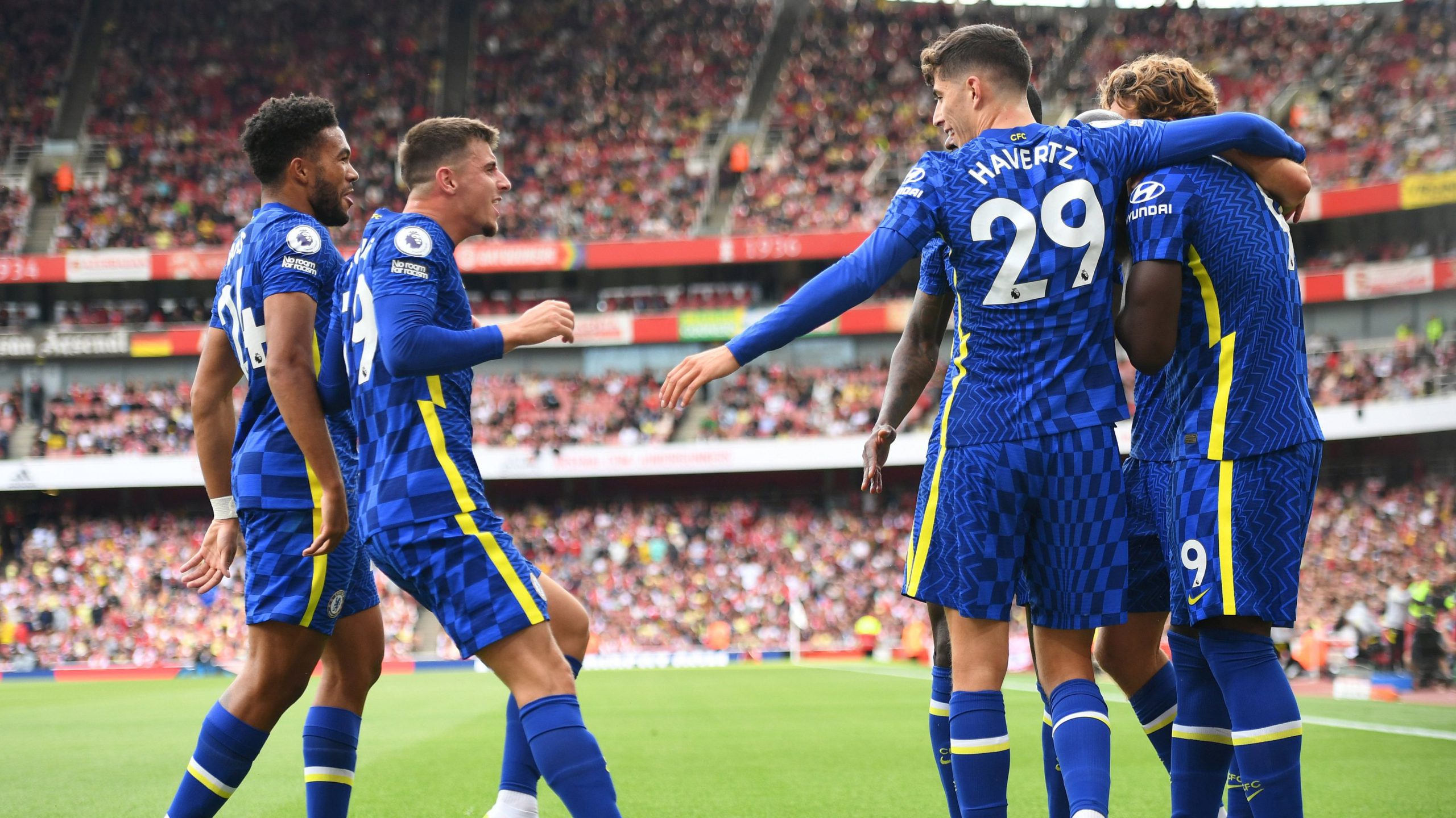 Chelsea players celebrating their goal